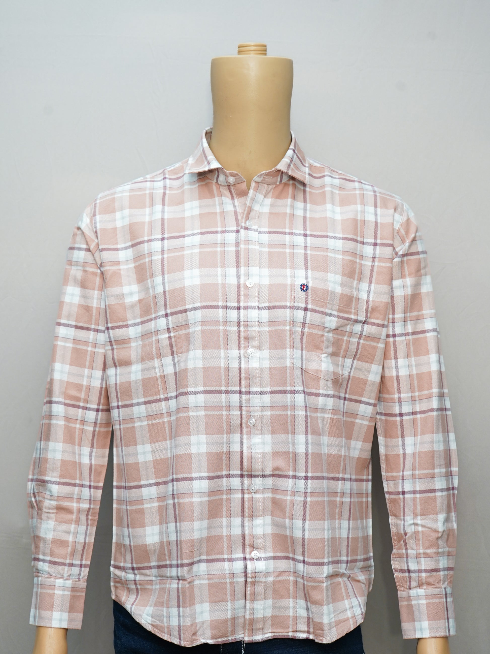 Full view of a peach beige check men's shirt styled on a mannequin, showcasing a classic and elegant design.