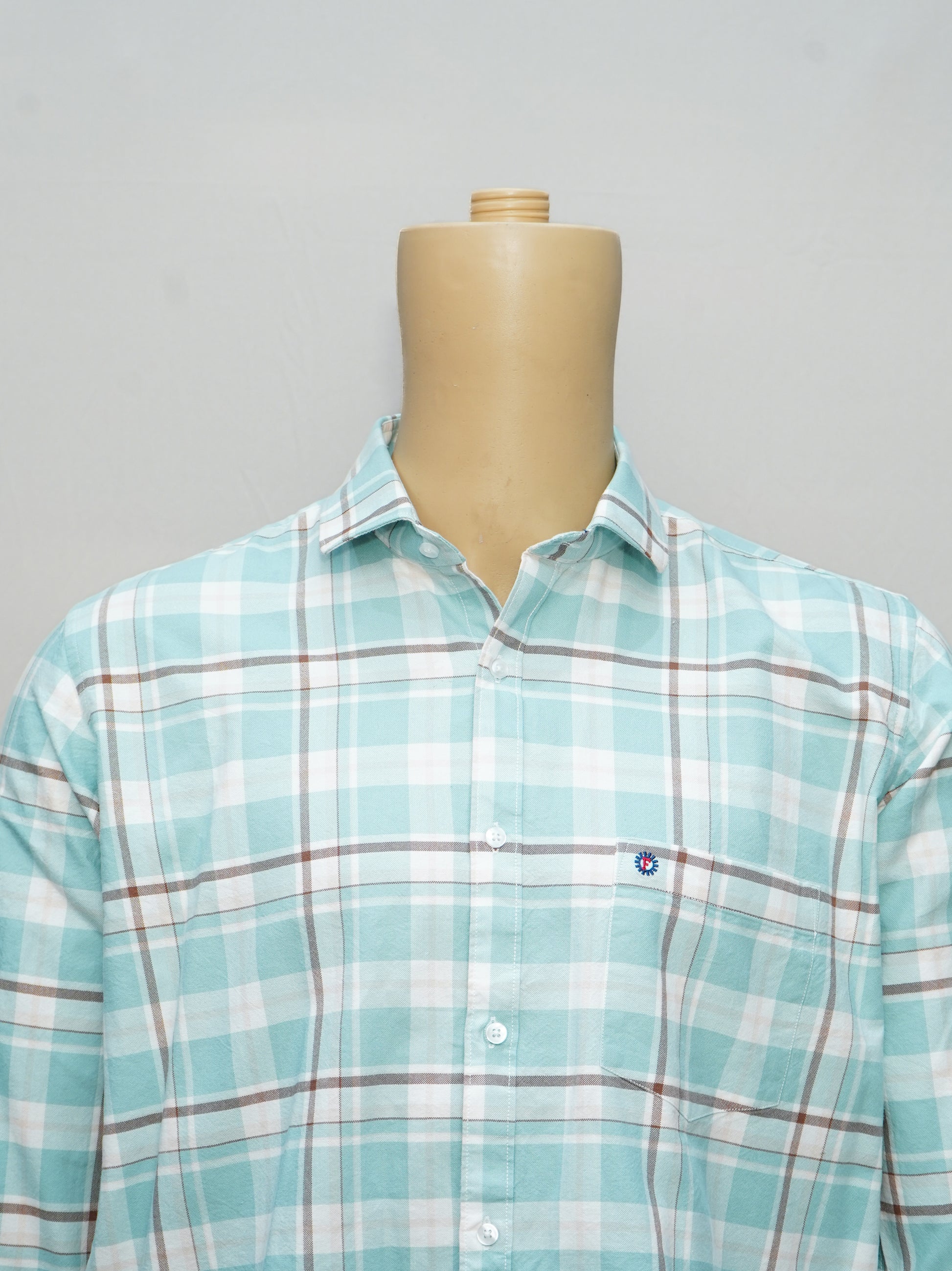 Close-up of the Fresh Aqua Check Men's Shirt, highlighting its aqua tones and classic check pattern.