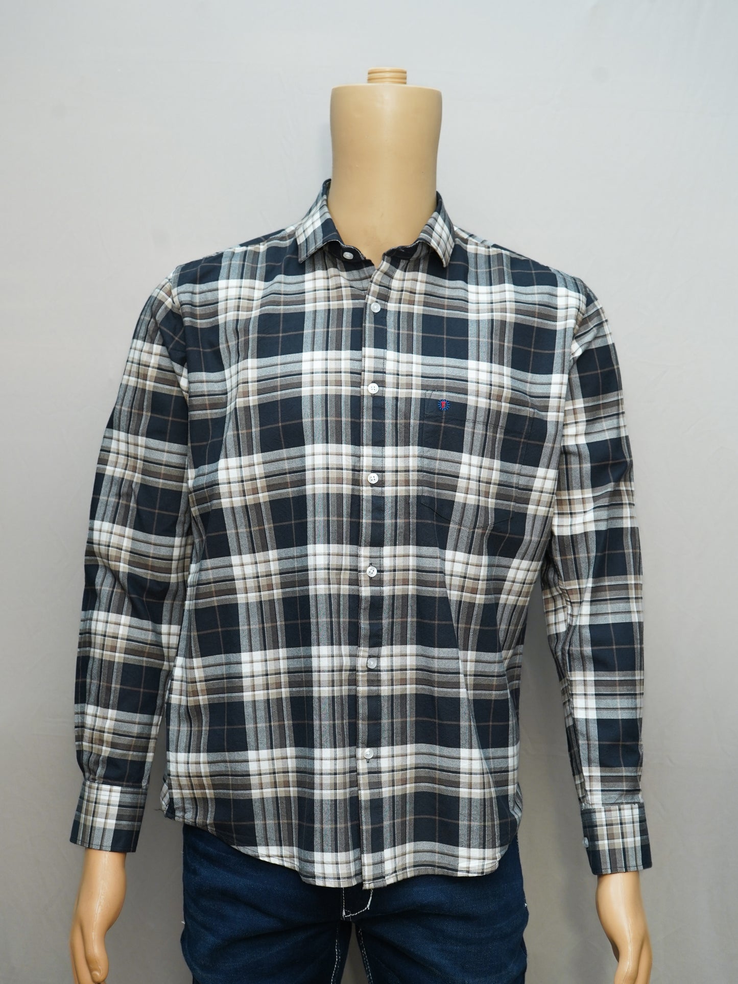Full view of a midnight plaid check men's shirt styled on a mannequin, featuring a bold and modern look.