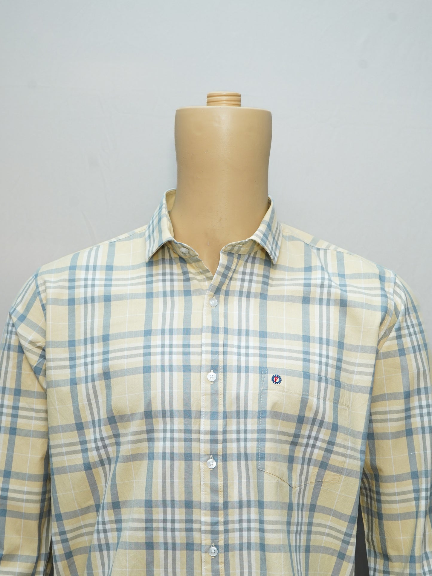 Close-up of Men's Yellow and Blue Check Shirt highlighting the soft cotton fabric and stylish design.