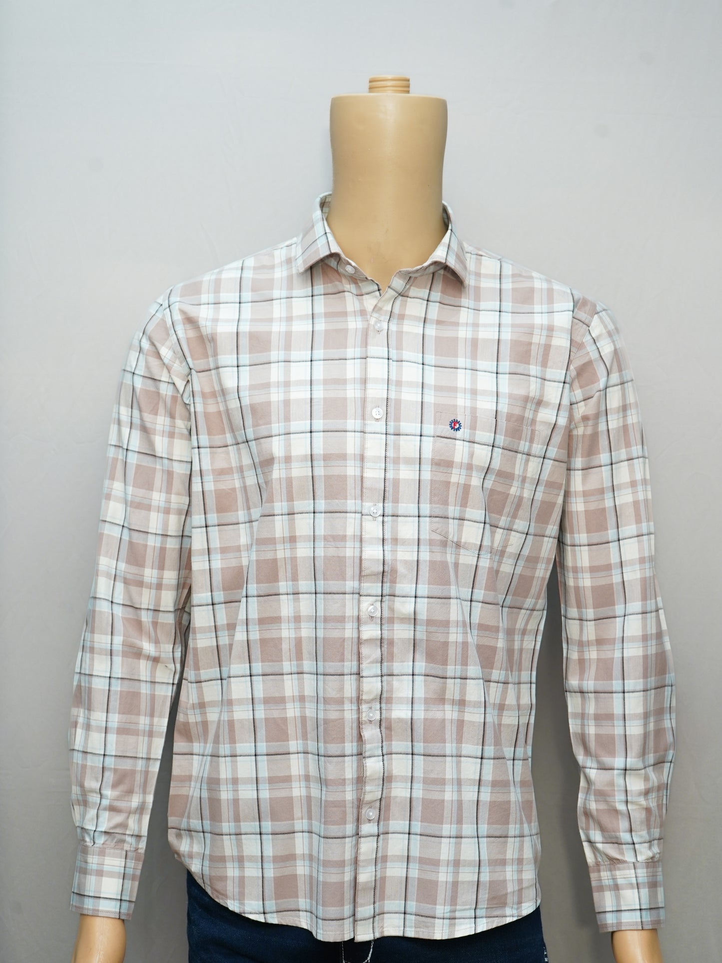 Front view of a stylish beige check shirt featuring a timeless check pattern.