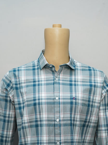 Front view of a teal and white check shirt .