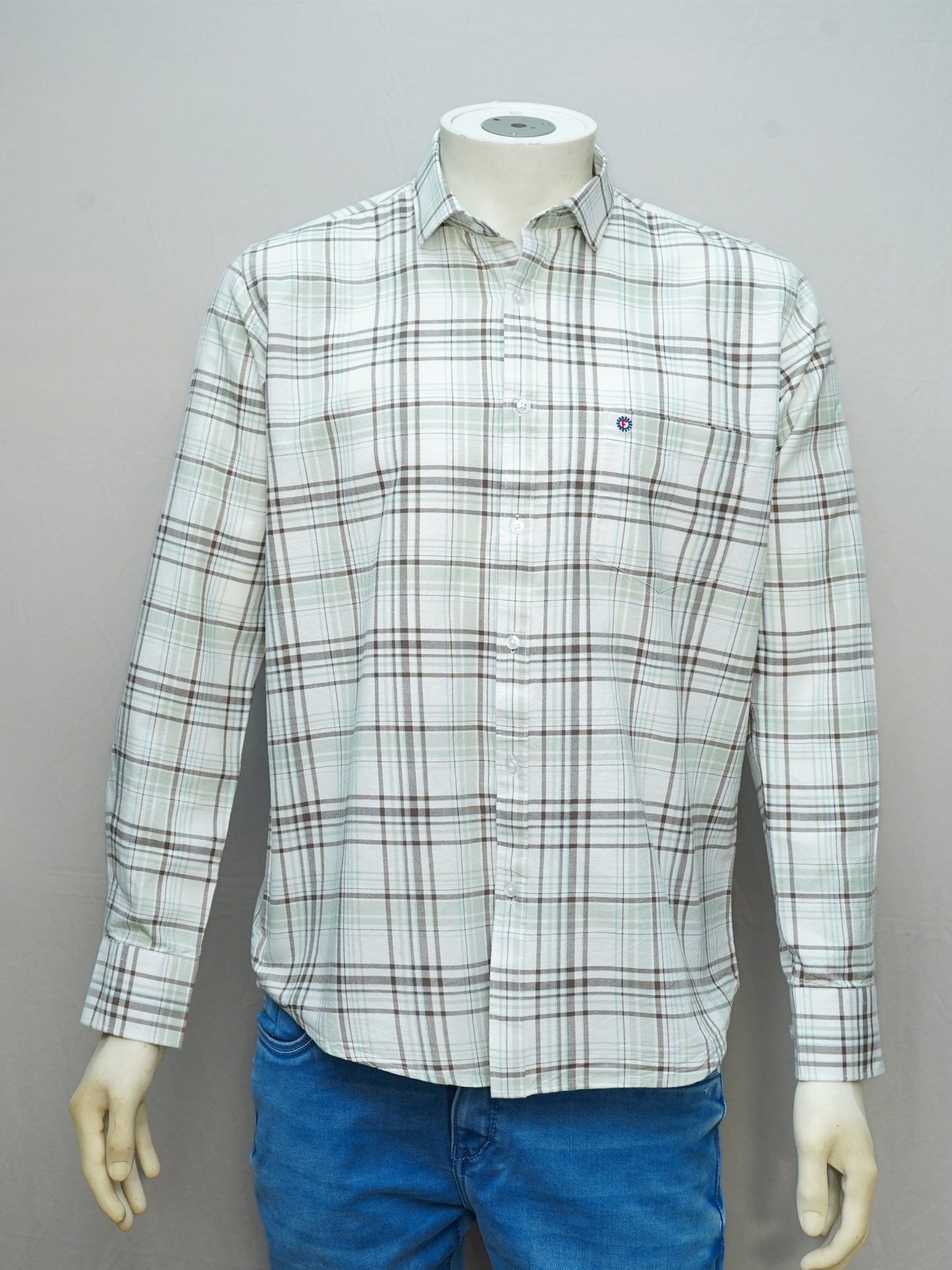 Front view of white and olive green check shirt for men.