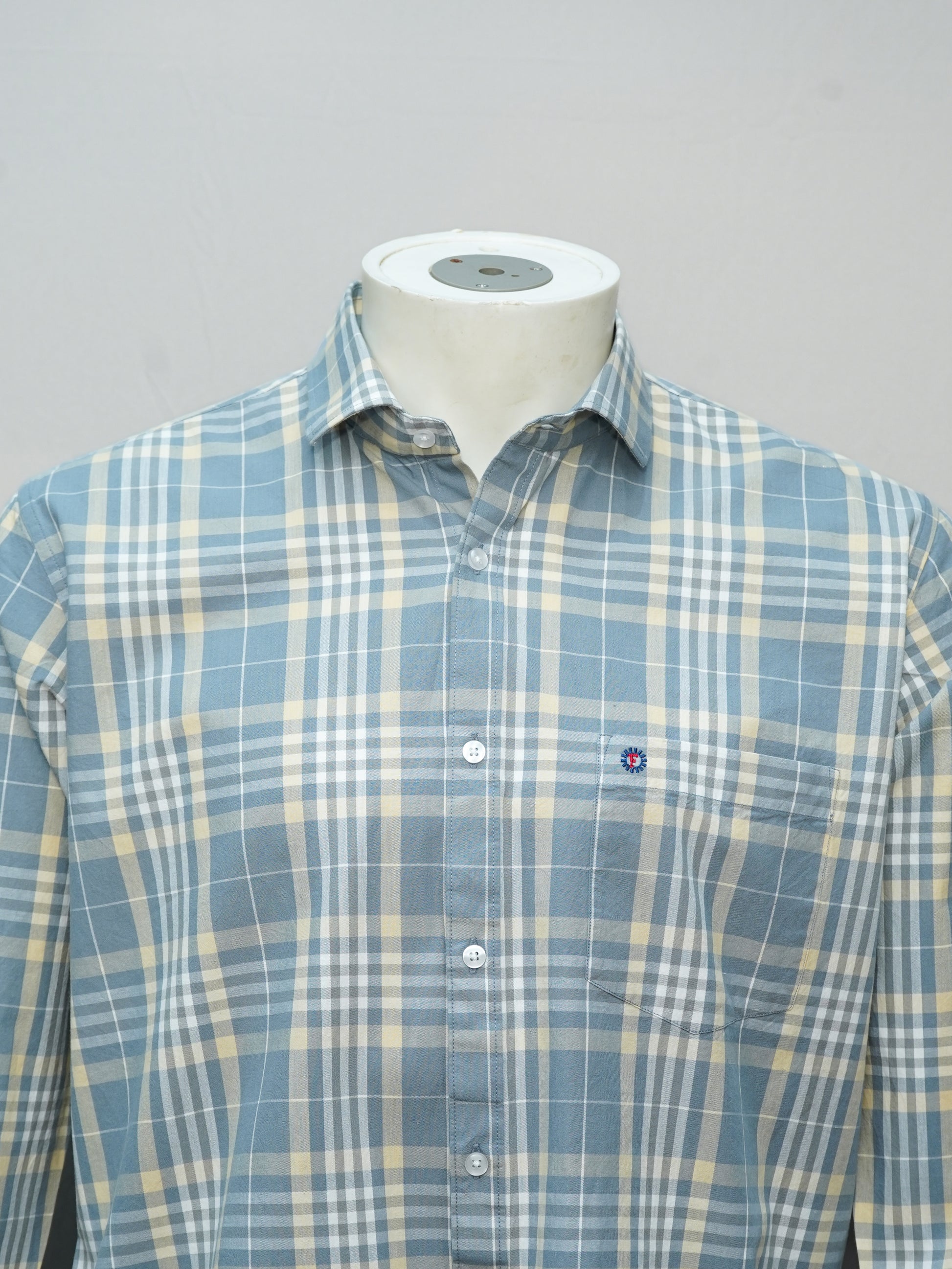 Full-sleeved Greyish Blue Check Shirt for Men styled with a classic pattern.