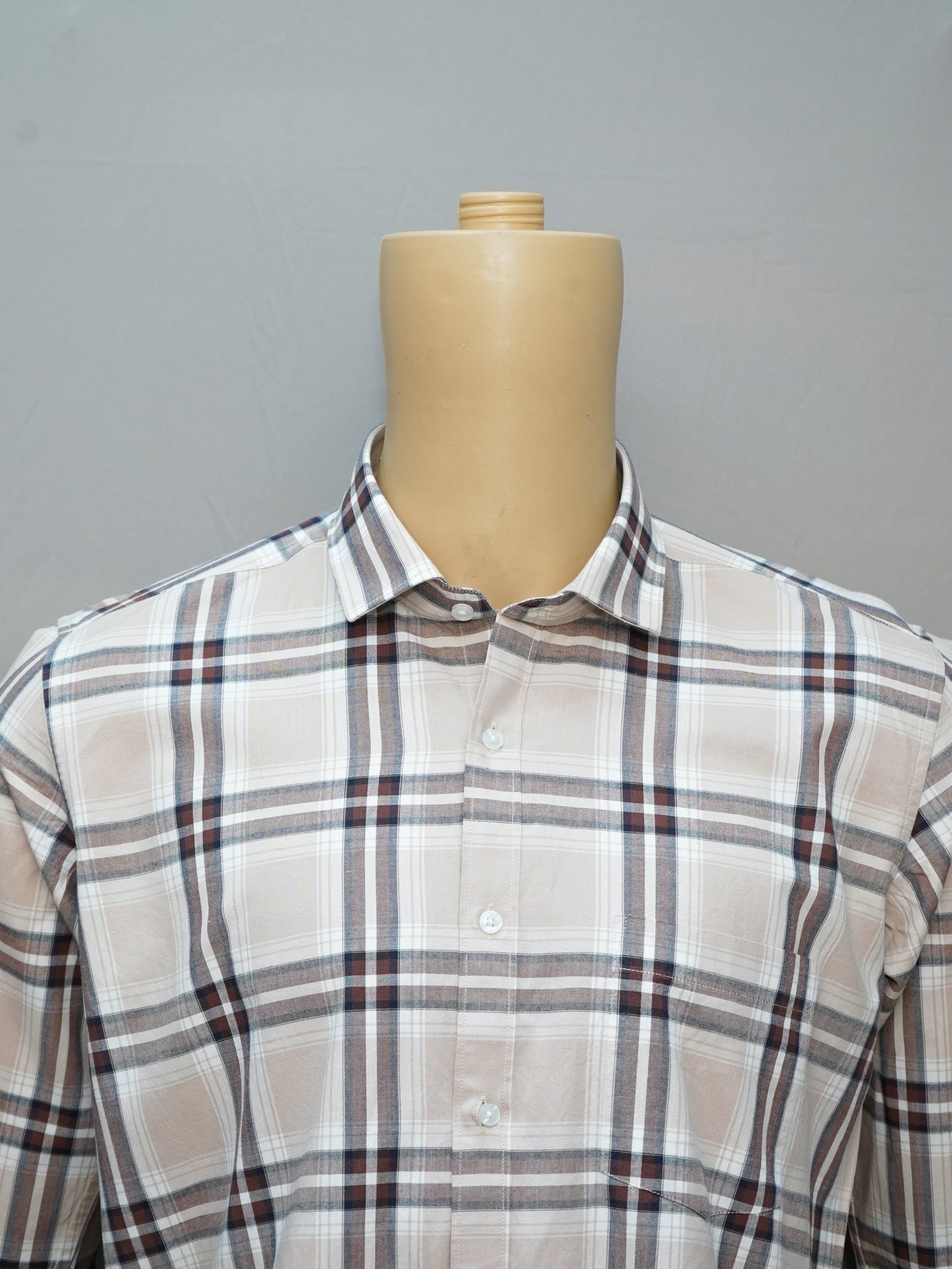 Front view of beige and maroon plaid cotton shirt for men.